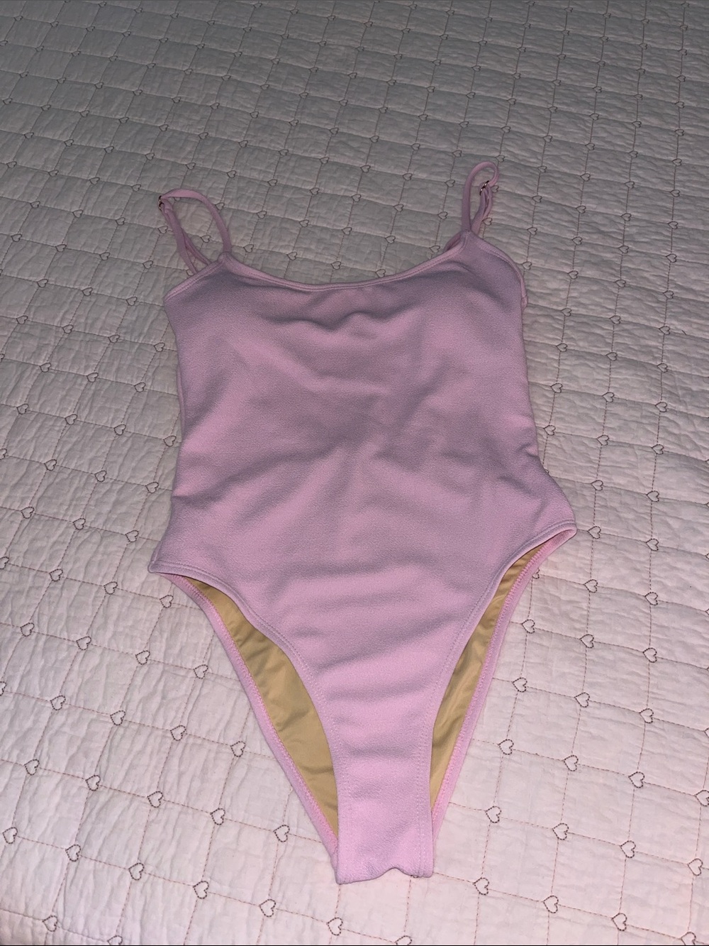 One piece pink cheeky low scoop